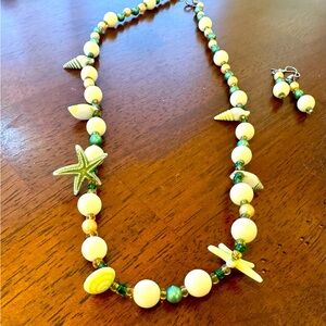 Handmade coastal beaded necklace and earrings set, green, gold, and ivory
